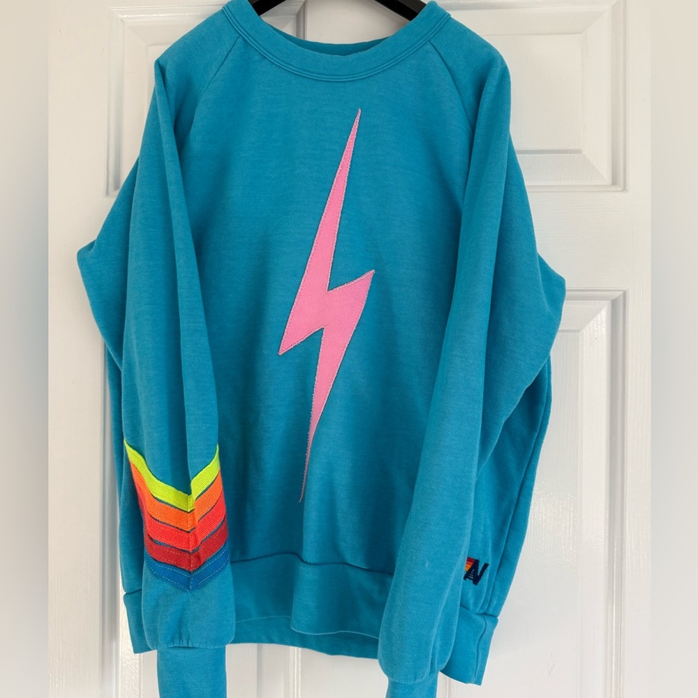 Aviator Nation Bolt Teal Sweatshirt with Pink Lightning Bolt.  Womens Size Small